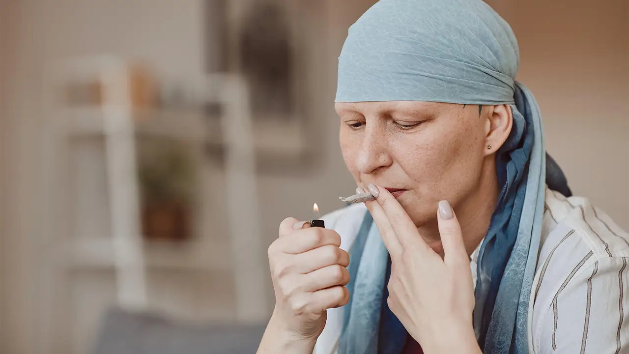 Cancer patient smoking cannabis
