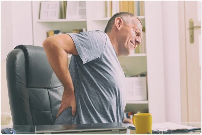 Man with chronic back pain
